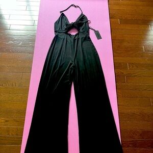 H’ours from Revolve black jumpsuit.